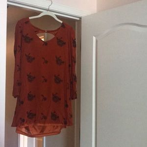 Orange dress with rose detail